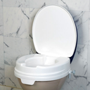 SERVOCARE Toilet seat raiser made of smooth plastic white
